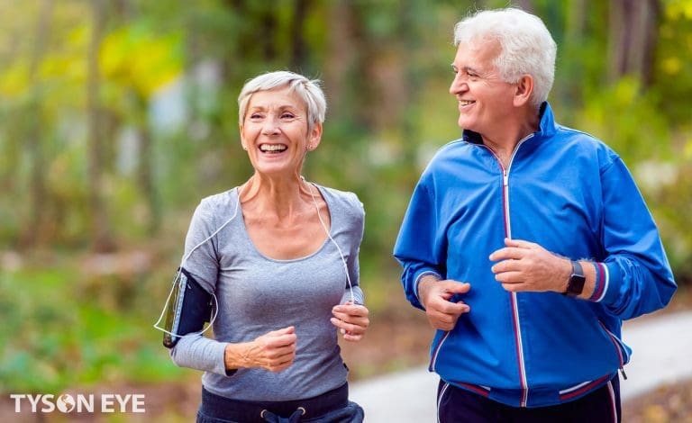 Older couple running. helping to get the tips for eye care in the winter