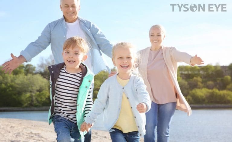 Grandparents playing with their grandchildren and understanding what to expect before, during, and after cataract surgery