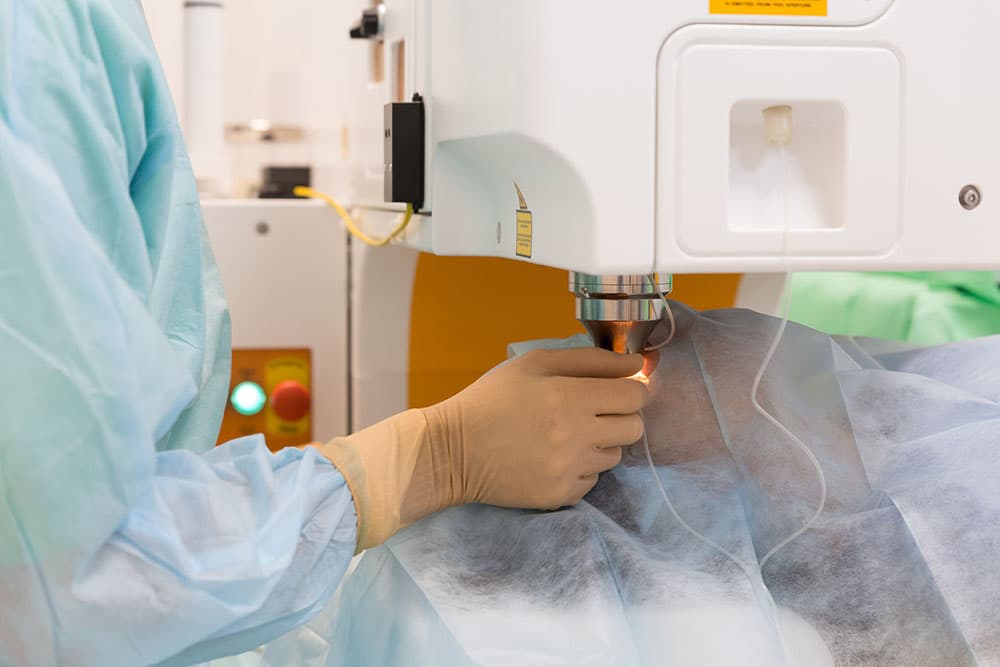 Eye surgeon prepping a patient for LASIK