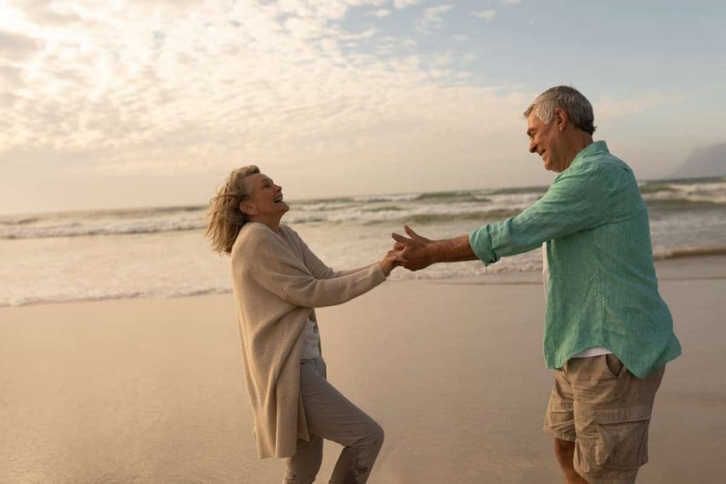 Elderly couple happy at the beach
