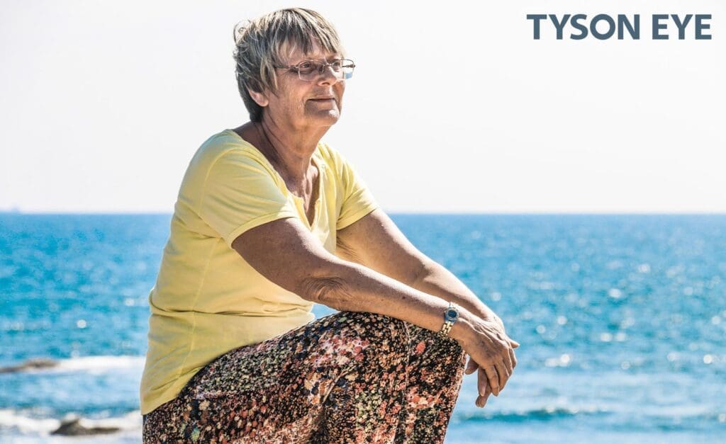 a person sitting outside for keeping their eyes healthy