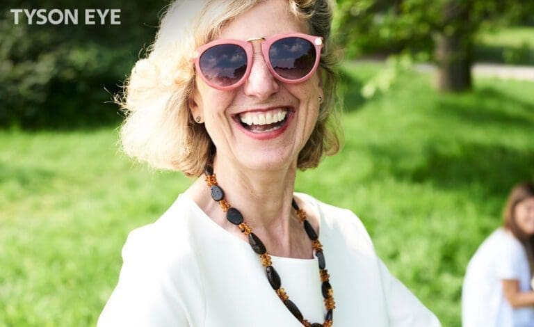 Woman showcasing the benefits of UV Protection lenses