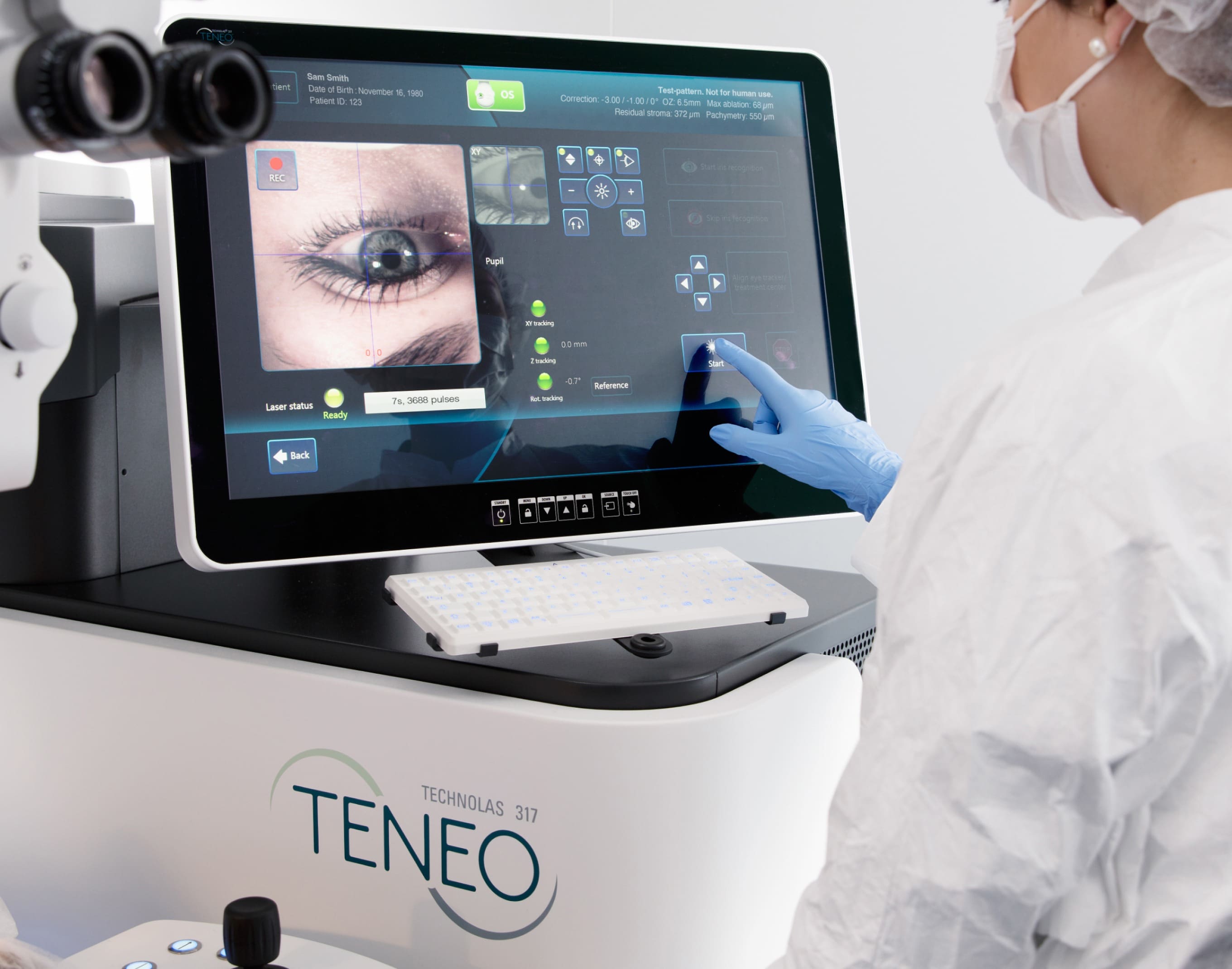 Person using the Teneo laser touch screen